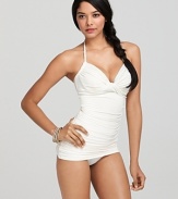 Searing poolside style takes form in this Carmen Marc Valvo swimdress, exuding retro glamour and pure class.