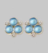 The lovely iridescence of cabochon moonstones, clustered amid diamond accents, gives these delicate earrings the feeling of being lit from within. Diamonds, 0.18 tcw Moonstone 18k yellow gold Length, about ½ Post back Made in Italy