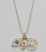 Three traditional protective amulets - the hamsa, the evil eye and the sacred om - dazzle in pavé diamonds with sapphire accents as they dangle from a 14k yellow gold ball chain. Diamonds, 0.38 tcw Blue sapphires 14k yellow gold Chain length, about 16 Pendants, about ¾L X ¾W each Lobster clasp Imported