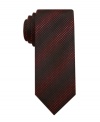 Classy style. Classy tie. Classy guy. It's all circular, especially when you're wearing this dotted skinny tie from Alfani.