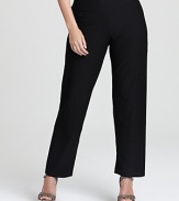 Eileen Fisher stretch crepe pants in plus size are straight leg with covered elastic waistband. Slips on over hips. Darts at back of pant.