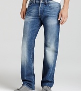 Suave straight leg jeans by Diesel featuring distressing and signature stitching on the back pockets.