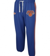 Show off your pride for the NY Knicks in these sweatpants by adidas.