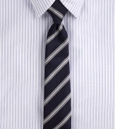 Trim stripes, pared in width to balance the cut of modern suits and jackets.Silk/cotton Dry clean Made in USA