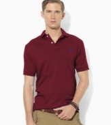 An iconic short-sleeved polo shirt is cut for a classic fit in smooth, soft cotton interlock.