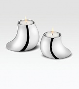 From the Cobra Collection. German designer Constantin Wortmann's tealights, in two different heights, are aptly named with subtle, serpentine curves.Stainless steel About 5¼H Dishwasher safe Imported