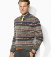 Knit from hearty wool yarns, a timeless V-neck sweater boasts a classic Fair Isle pattern for an authentic, handsome look.