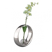 Complete with a white orchid set at a rakish angle, this bud vase combines a round, tapered band of Nambé Alloy and a glass center into an objet d'art suitable for any room in the house. The vase measures 7 inches in diameter. Designed by Neil Cohen.