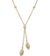 Elaborate your neckline with the perfect lariat necklace. Crafted in 14k gold, this unique design features subtle beaded details and two delicate, marquise-shaped drops. Approximate length: 17 inches. Approximate drop: 2 inches.