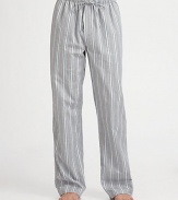 Stylish woven cotton lounge pant features a sophisticated stripe pattern for a streamlined finish.Elastic drawstring waistInseam, about 32CottonMachine washImported