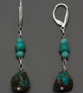 Smooth, peaceful turquoise adds appeal to any look. Earrings in off-shape baroque turquoise with sterling silver. Approximate drop: 2-1/4 inches.