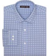 This classic fit Michael Kors dress shirt boasts a spread collar and barrel cuffs with a mod blue and navy check print.