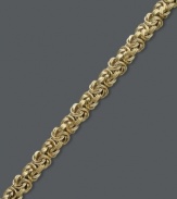 Luxurious links. This simple chain bracelet adds shimmer and shine. Crafted in 14k gold with a small Byzantine link. Approximate length: 7-1/2 inches.