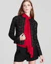 Tailored in leather-trimmed lace, this DIANE von FURSTENBERG jacket delivers ladylike style with an edge.