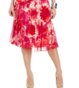 A floral print and allover pleats create an ethereal, feminine look in this skirt from Jones New York.