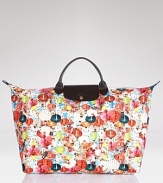 Longchamp's reliable French design goes graphic with this bright tote. Shoulder the color-splashed carryall for a practical pick-me-up--it's sized just right for all your essentials.