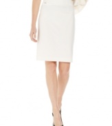 Bold white updates the classic pencil skirt silhouette for a fresh look that works any time of year. From Calvin Klein.