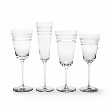 Kate Spade and Lenox join together to bring ease, elegance and understated wit to the table. Library Stripe Stemware features frosted stripes on tall, elegant stems. Shown from left to right: goblet, flute, iced beverage, wine glass. Coordinates perfectly with the Library Stripe Dinnerware.