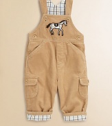 Every little guy needs overalls, and these are especially refined in plush cotton corduroy with a plaid twill lining and a frisky appliquéd horsie on the bib.Button strapsAppliquéd horse on bibMock flyAngled front pocket flapsButton sidesButton flap cargo pocketsBack patch pocketsInseam snaps of back cuffCottonMachine washImported