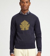 Be the center of attention in this classic crewneck, handsomely woven in soft cotton, with leaf print design.CrewneckRibbed knit collar, cuffs and hemCottonDry cleanImported