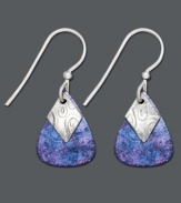 A splash of color adds an artistic touch to your look. Earrings by Jody Coyote feature midnight blue bronze patina teardrops with decorative silver charms. Earrings crafted in sterling silver. Approximate drop: 1 inch.