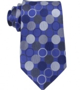 Enter the winner's circle. This spotted tie from Michael Kors will round out your look nicely.