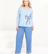 On the prowl for the season's coziest pajamas? Look no further than this fuzzy fleece plus size set by HUE, featuring a sweet top with a sequined print and full-length pajama pants.