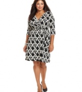 Delight from day to play with AGB's three-quarter sleeve plus size dress, outlined by a slimming faux wrap design.