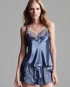 Lace accents lend luxe, feminine flair to this cami and shorts set from Flora Nikrooz.