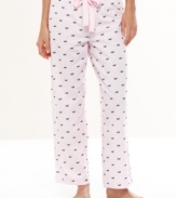 Lounge around in the easy style of Nautica's Woven Ankle pajama pants. This super soft cotton pair features an elastic waistband with a cute ribbon drawstring.