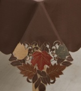 Featuring elaborate cutwork, embroidered accents and leaves piled in rich fall colors, the Maple Leaf round tablecloth sets the scene for an unforgettable autumn, year after year. (Clearance)