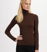 Velvet soft and made in a stretch cotton seamless knit, this pullover is light enough for layering.50% cotton/46% nylon/4% elastene Dry clean Imported