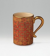 Serve coffee or tea in ceramic mugs, handpainted in a pattern inspired by Tabriz rugs. Rich, warm colors accented with 14K gold filet handle and rim.Each mug is 4 tall; 2¾ diameter Hand wash Made in Portugal