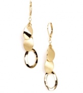 Shake up your style in chic metallic charms. Nine West's gleaming drop earrings feature circular charms in gold tone mixed metal. Approximate drop: 2 inches.