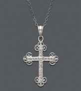 No ordinary way to express your faith, this exquisite style features intricate scrolls of sterling silver that shine with the addition of sparkling diamond accents. Approximate length: 18 inches. Approximate drop: 2-1/4 inches.