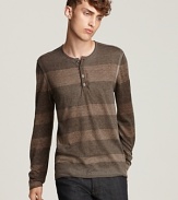 The John Varvatos sweater rolls out the stripes in a muted reverse print.