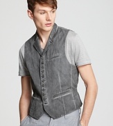 Weathered and detailed with close-set buttons and darting for a slimmer fit, this vest adds edge to your everyday look.