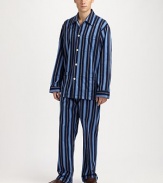 Incredibly cozy, lounge in style in fine cotton pajamas with classic stripe pattern. Machine wash. Imported.SHIRTButtonfrontSpread collarChest, waist patch pocketsPANTSFlat-front styleAdjustable two-button waistNo flyInseam, about 31