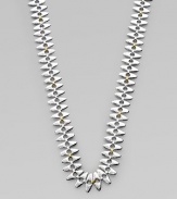 A unique design with tribal appeal in sleek sterling silver and radiant 24k gold. Sterling silver24k goldLength, about 39½ Lobster clasp closureImported 