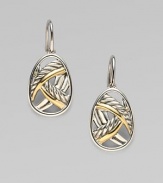 From the Papyrus Collection. Smooth and cable curves of sterling silver and 18k yellow gold richly intertwine within egg shapes.Sterling silver and 18k yellow gold Length, about ¾ Ear wire Imported