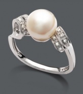 Add a twist to your look with polish and shine. Ring by Belle de Mer features an intricate setting and double loop design highlighting a cultured freshwater pearl (8-9 mm). Crafted in sterling silver with sparkling diamond accents. Size 7.