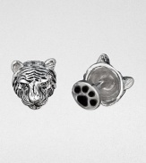 Wild about style, these antiqued sterling silver cuff links are crafted in a tiger's head and paw design.Sterling silverPaw-shaped backAbout .67 diam.Made in USA