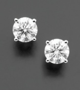 Two carats worth of sparkling diamond in each ear frames the face perfectly. For a style always in season, snap up round-cut diamond studs (2 ct. t.w.) set in 14k white gold. Approximate diameter: 6-1/2 mm.