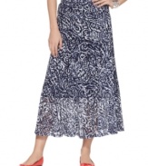 A swirling paisley print on mesh fabric transforms a simple midi skirt into something striking, from JM Collection.