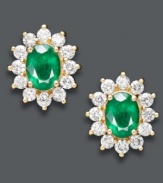 Frame your face with a glamorous, green glow. Effy Collection's regal looking stud earrings highlight oval-cut emeralds (2-1/4 ct. t.w.) and round-cut diamonds (1-3/8 ct. t.w.) set in 14k gold. Approximate drop length: 9/16 inch. Approximate drop width: 1/2 inch.