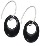 Elliptical elegance. Bold round onyx (22 ct. t.w.) in a contemporary silhouette stands out in this pair of sterling silver drop earrings to stunning effect. Approximate length: 2-3/4 inches. Approximate width: 3/4 inch.