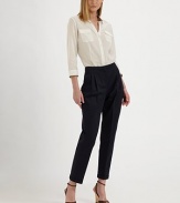 This cropped, crisply pleated design is impeccably tailored for a flattering fit.Self waistband with belt loops and back notchZip fly with hook-and-bar closureFront pleatsCuffed legBack button welt pocketsInseam, about 2766% linen/32% cotton/2% elastaneDry cleanMade in Italy of imported fabricModel shown is 5'9½ (176cm) wearing US size 4.OUR FIT MODEL RECOMMENDS ordering true size. 