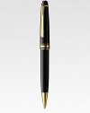 Ballpoint pen with twist mechanism, with barrel and cap made of precious resin and floating logo emblem.BallpointGold-plated clipResin with inlaid logo emblemAbout 5¼ longImported