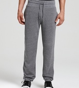 Heathered ALTERNATIVE sweatpants in plush fleece with an elastic waistband and ankle cuffs.