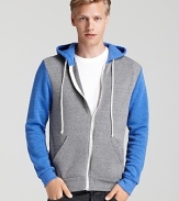 Color-blocking lends on-trend appeal to this zip hoodie from Alternative.